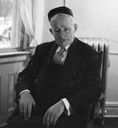 Herman Seibel sitting at home